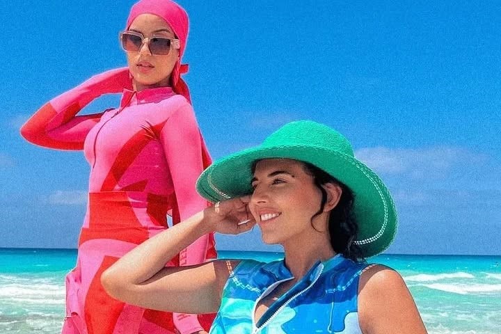 Beautiful Hadia Ghaleb spotted in North Coast, Egypt with fan wearing her latest collection from @hadiaghaleb.com and both look fabulously chic.