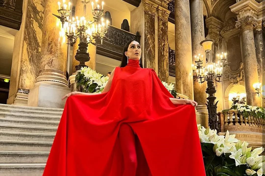The gorgeous @ghadaabdelrazek stuns in a @stephanerolland_paris outfit to the designer’s Fall Winter 2023-24 Couture Show, held in Paris at #operadegarnier.