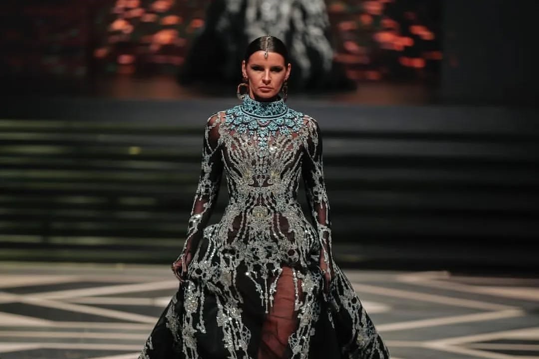 Witness the epitome of style and sophistication at the mesmerizing fashion show presented by Michael Cinco in Alamein City. 