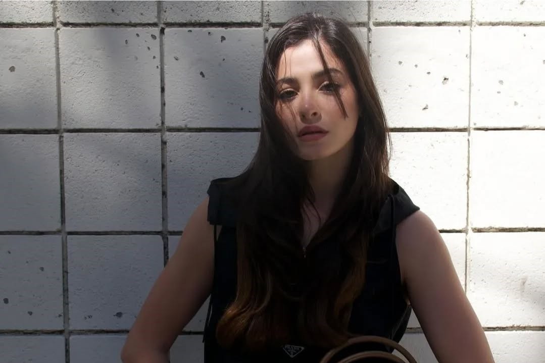 Confidently rocking the new Prada Re Nylon bag in style with Yusra Mardini.