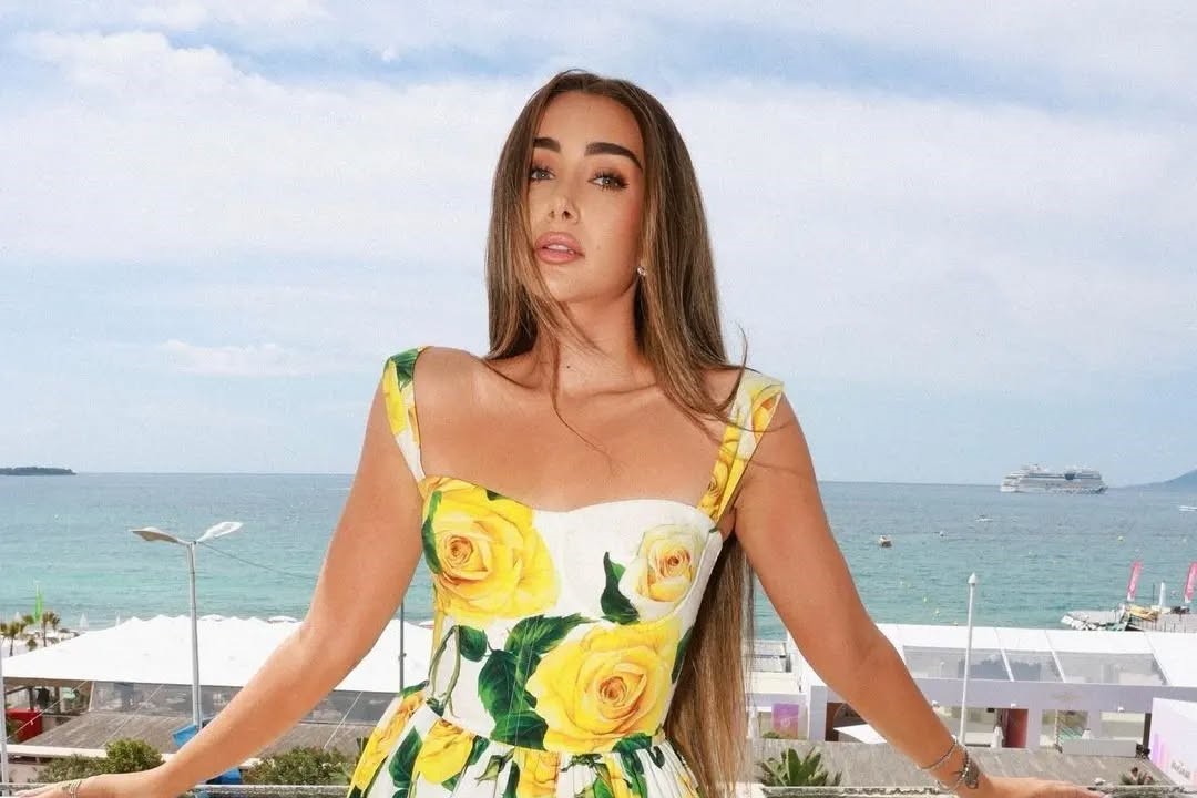 Hana El Zahed radiates elegance in a stunning Dolce & Gabbana dress in Cannes, effortlessly blending classic charm with modern allure.