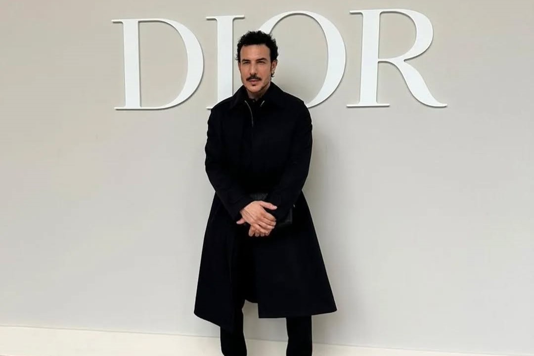 Actor Bassel Khaiat exudes sophistication at Dior’s Summer ’25 collection in Paris, effortlessly embodying chic elegance.